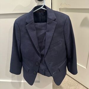 Boys Michael Kors navy blue suit. Size 6 (23” waist). Sportcoat and pants.